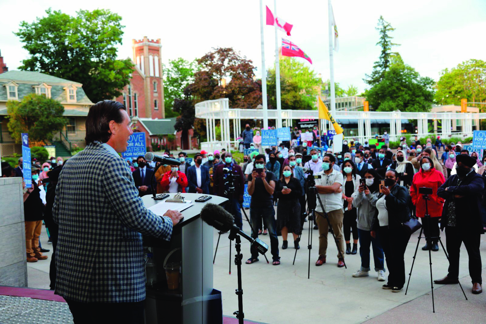 Brampton Mayor Patrick Brown (left) speaks in front of a group of onlookers Monday evening (June 14), during an interfaith vigil, held in front of Brampton City Hall, to remember members of the Afzaal family, who were targeted by a driver in a “horrific act of Islamophobia” on June 6. (Photo Courtesy of City of Brampton / Urz Heer)